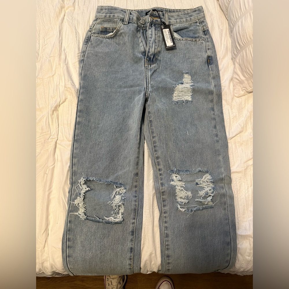 Pretty Little Things. Brand new. Never worn. Tags still on. Size 0.